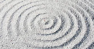 a photo of concentric circles of gravel from a zen garden