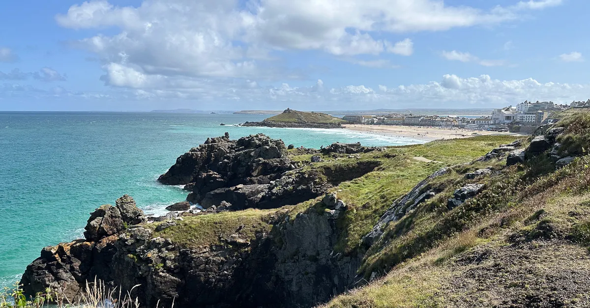 a landscape photograph of the coast of cornwall, taken on the coast path near to Zennor, looking towards St Ives