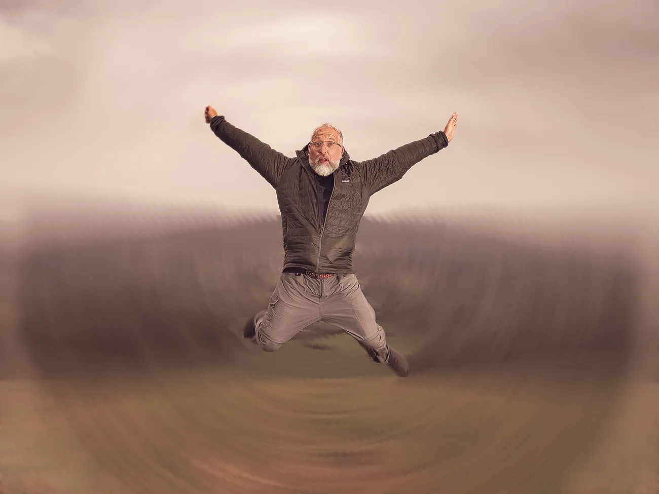 Stu appears to be falling center frame into some kind of spirally revolving portal!